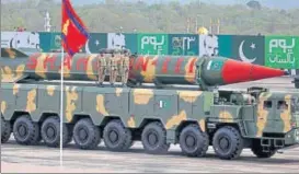  ?? AP FILE ?? A Pakistanim­ade ShaheenIII missile on display during a military parade in Islamabad.