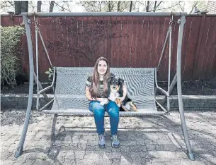  ?? ANDREW FRANCIS WALLACE TORONTO STAR ?? Mara Howard with her service dog, “iubi.” Howard has been struggling with mental health challenges since she was 15 and is offering tips for others feeling stressed during the pandemic.