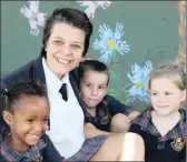  ?? PICTURE: NQOBILE MBONAMBI ?? Chenoa Brenkman, 17, sits with Nandi Cele, 4, Jayde de Fortier, 4, and Damon Parton, 5, all of St Benedict School. Chenoa was the youngest nominee at the Woman of Stature awards in Johannesbu­rg this month.