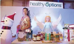  ??  ?? Rhian Ramos checks out the delicious snacks and condiments showcased at Healthy Options.