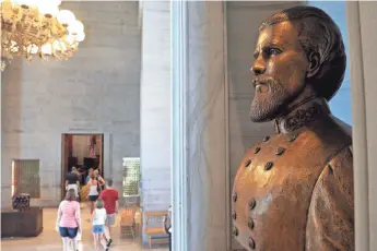  ?? LARRY MCCORMACK, THE TENNESSEAN ?? A bust of Nathan Bedford Forrest remains a fixture at the Tennessee State Capitol in Nashville.