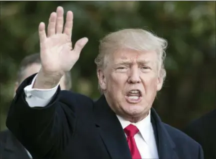  ?? ASSOCIATED PRESS ?? President Donald Trump waves to media as he arrives on Marine One at the White House in Washington, D.C.