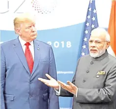  ??  ?? Trump listens to Modi during a meeting in the sidelines of the G20 Leaders’ Summit in Buenos Aires. — AFP photo