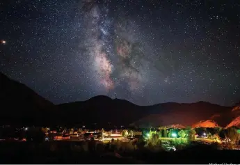  ?? Michael Underwood, Special to The Denver Post ?? The Milky Way, as seen above Lake City, Colo. Scientists discovered recently that the galaxy, as seen from Earth, obscures the South Pole Wall, a curtain of thousands of galaxies across at least 700 million light-years of space.