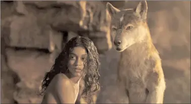  ?? NETFLIX VIA AP ?? This image released by Netflix shows Rohan Chand as Mowgli, left, and the character Nishi, voiced by Naomie Harris, in a scene from the film, "Mowgli: Legend of the Jungle," streaming on Netflix on Friday.