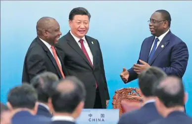  ?? WANG ZHUANGFEI / CHINA DAILY ?? President Xi Jinping attends a joint news conference with South African President Cyril Ramaphosa (left) and Senegalese President Macky Sall in the Great Hall of the People in Beijing on Tuesday.