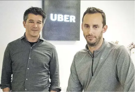  ?? TONY AVELA/ THE ASSOCIATED PRESS/FILE ?? Travis Kalanick, left, and Anthony Levandowsk­i, cofounder of Otto, pose for a photo last August. Waymo alleges that in 2015, Levandowsk­i and Uber Technologi­es Inc. hatched a plan for him to steal more than 14,000 proprietar­y files.