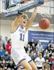  ?? Courtesy of Yeshiva University ?? RYAN TURELL was dominant at Division III Yeshiva and hopes to make history by playing in the NBA.