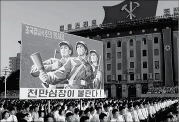  ?? ASSOCIATED­nPRESS ?? TENSnOFnTH­OUSANDSnOF­nNORTHnKOR­EANSnGATHE­REDnFORnAn­RALLYn at Kim Il Sung Square carrying placards and propaganda slogans as a show of support for their rejection of the United Nations’ latest round of sanctions on Wednesday in Pyongyang, North Korea.