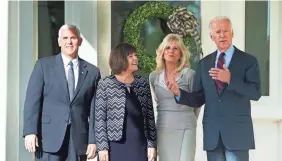  ?? CLIFF OWEN/AP ?? The Bidens welcome Vice President-elect Mike Pence and his wife, Karen, to the Naval Observator­y on Nov. 16, 2016.