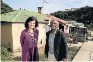  ??  ?? LAST OF SOUTH END: MBDA planning and developmen­t manager Dorelle Sapere and marketing and communicat­ions manager Luvuyo Bangazi at one of the homes in Ellis Street