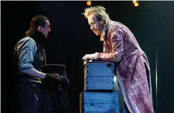  ??  ?? Facing off: Cratchit (John Dagleish) and Scrooge (Rhys Ifans) in A Christmas Carol