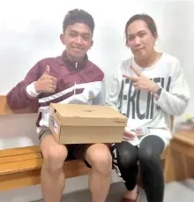  ?? BEVERLY VILLARINO PHOTOS ?? NEW SPIKES. Lorenz Datiles of Sto. Tomas, Davao del Norte, the most decorated track and field athlete of the Davao Region Athletic Associatio­n (Davraa) Meet 2024 and the owner of ‘FrankenSpi­kes,’ beams with joy as he poses with his new track shoes, gifted by generous donors.