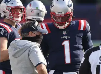  ?? NAncy LAnE / hErALd stAFF FILE ?? NEW PLAN? Patriots coach Bill Belichick, left, must have known he wouldn’t have Tom Brady at the helm forever, but Cam Newton, right, obviously wasn’t the right plan moving forward.