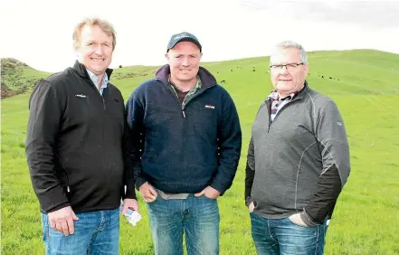  ??  ?? FarmRight investment manager Tony Cleland, left, farm manager Shane Woodford and NZ Super Fund rural portfolio manager Neil Woods have been involved in the conversion of a Kaiwera sheep farm to beef. PHOTO: DIANE BISHOP