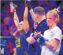  ?? ERIC JAMISON/ ASSOCIATED PRESS ?? Amanda Nunes, left, celebrates her win over Holly Holm, right, Saturday at UFC 239. Holm has now lost five of her last seven fights but says she has no plans to retire.
