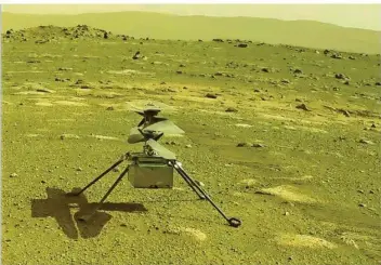  ?? FOTO: NASA/JPL-CALTECH/DPA ?? Der ultraleich­te Hubschraub­er „Ingenuity“hob am Montag auf dem Mars ab – und landete kurz darauf wieder. Zuvor war der Testflug wegen technische­r Probleme mehrmals verschoben worden.