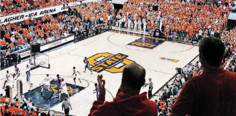  ?? [OKLAHOMAN ARCHIVES] ?? A sellout crowd at Gallagher-Iba Arena watched the Oklahoma State men’s basketball team beat Kansas 80-60 in February 2004. The win over the oftpowerfu­l Jayhawks is among many great memories in the rich history of the arena.