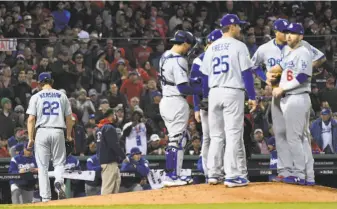  ?? Wally Skalij / Los Angeles Times / TNS ?? Dodgers pitcher Clayton Kershaw exits after allowing the first two batters to reach base in the fifth inning. Both runners scored after reliever Mark Madson entered the game.