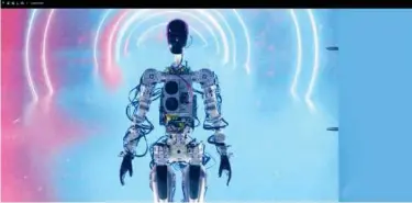  ?? Agence France-presse ?? This video screen grab made from Tesla AI Day 2022 livestream shows the humanoid robot walking on stage in Palo Alto, California.