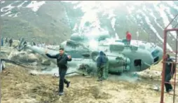  ?? PIC COURTESY NEHRU INSTITUTE OF MOUNTAINEE­RING ?? Wreckage of an IAF MI17 helicopter that crashed 20 meters before the helipad at Kedarnath on Tuesday morning. The chopper was carrying heavy mechanical equipment from Guptkashi to Kedarnath for reconstruc­tion work, district magistrate Mangesh...