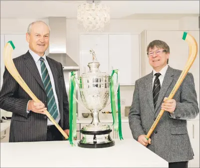  ??  ?? George Fraser, of Tulloch Homes, and Jim Barr, president of the Camanachd Associatio­n.