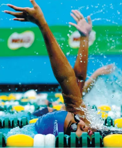  ?? (SUN.STAR FOTO/ALEX BADAYOS) ?? OUT OF REACH. Lyn Ann Navarro of CEC settles for the silver medal in the secondary girls 200m IM in the Milo Little Olympics.