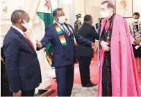  ??  ?? President Mnangagwa receives credential­s from incoming Tanzanian Ambassador to Zimbabwe Professor Emmanuel Mbennah (top left) while (top right) the President introduces incoming Vatican Ambassador to Zimbabwe, Archbishop Paolo Rudelli, to Foreign Affairs and Internatio­nal Trade Minister Dr Sibusiso Moyo at State House in Harare yesterday