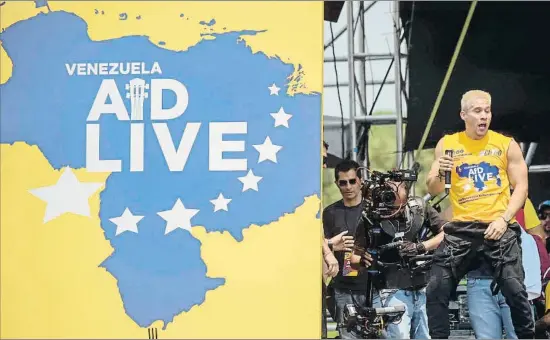  ?? RAUL ARBOLEDA / AFP ?? El cantante venezolano Chyno actuando en el concierto Venezuela Aid Live, organizado por el millonario Richard Branson
