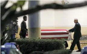  ?? Reuters ?? Following a public viewing, the coffin of US army Sgt La David Johnson is taken from Christ the Rock Church in Cooper City, Florida, yesterday