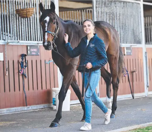  ?? ?? Doomben Cup favourite Zaaki with stable foreman Isabella King ahead of the big race. Picture: Lyndon Mechielsen