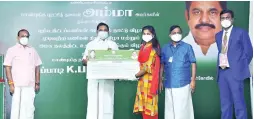  ??  ?? Chief Minister Edappadi K Palaniswam­i handing over welfare assistance to a beneficiar­y in Kanniyakum­ari on Tuesday. In total Rs 54.22 crore was given through various department­s to 2,736 beneficiar­ies
