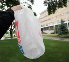  ?? CITIZEN PHOTO BY BRENT BRAATEN ?? Councilor Murry Krause asked about banning the use of plastic bags in Prince George at a council meeting.