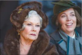  ?? Associated Press photos ?? This image released by Twentieth Century Fox shows Judi Dench, left, and Olivia Colman in a scene from “Murder on the Orient Express.”