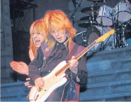  ?? Getty. ?? Ozzy Osbourne and Bernie Torme performing in 1982.