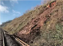  ?? NETWORK RAIL. ?? Rope teams using hand tools were employed to repair this embankment at Lydney.