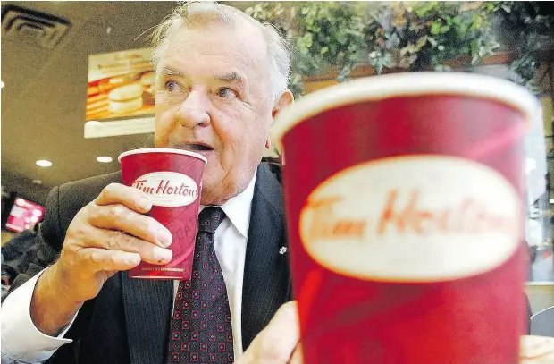  ?? AARON HARRIS / THE CANADIAN PRESS FILES ?? Ron Joyce came from humble origins to build a fortune from the Tim Hortons coffee and doughnut empire.