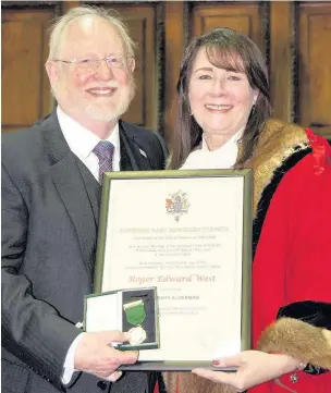  ??  ?? ●● Honorary Alderman Roger West with mayor Councillor Olivia Hunter