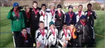  ??  ?? The Patriot FC Black U13 boys soccer team captured the top trophy in the FC Europa Turf Cup tournament held March 2-3 in Downingtow­n. Pictured in the first row, from left: Ryan Pave, Luke Rogers, Michael Vitella, Ben Dickinson, Ryan Danastorg and Head...