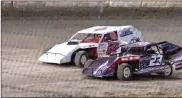  ?? PILOT PHOTO/MAGGIE NIXON ?? The UMP Modifieds put on one of the hardest-fought races on opening night of Plymouth Speedway.