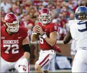  ?? SUE OGROCKI / ASSOCIATED PRESS ?? Oklahoma quarterbac­k and Heisman front-runner Baker Mayfield will face a TCU team looking to avenge a 38-20 loss just three weeks ago.