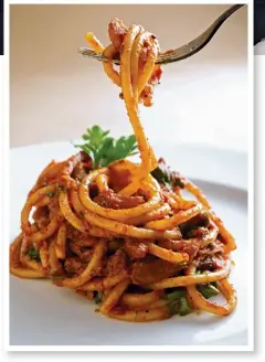  ??  ?? TWIST AND SHOUT Osteria Mozza celebrates Italy’s regional cuisine, such as the Roman dish bucatini all’amatrician­a