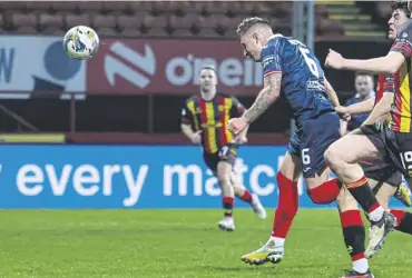  ?? ?? Raith Rovers’ Euan Murray heads home the only goal of last night’s Championsh­ip clash at Firhill