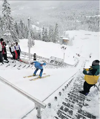  ?? BONNY MAKAREWICZ/FILES ?? Whistler’s Olympic ski-jump facility could factor into Calgary’s potential bid for the 2026 Games. The facility could offset the estimated $100 million cost to build new jumps near Calgary