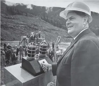  ?? DENI EAGLAND/ FILES ?? Premier W.A.C. Bennett was a natural at big political events, such as this one where he dons a hard hat for a ceremony marking the constructi­on of the Peace River dam project in July 1964.