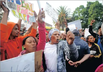  ?? Picture: AYANDA NDAMANE ?? OUTRAGE: Elsies River residents protest during the arrival of a man accused of killing three-year-old Courtney Pieters at Goodwood court earlier this month.