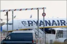  ?? THE ASSOCIATED PRESS ?? A Ryanair plane sits on the tarmac at the BordeauxMe­rignac airport in southweste­rn France, after being impounded by French authoritie­s, Friday. Storms, strikes, computer failures — you can now add “your plane has been seized by the government” to the list of things that can delay your flight.
