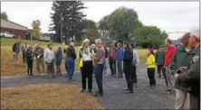  ?? MARIAN DENNIS – DIGITAL FIRST MEDIA ?? Groups crowded around the newly opened portion of the Big Woods Trail following the ribbon-cutting Friday morning.