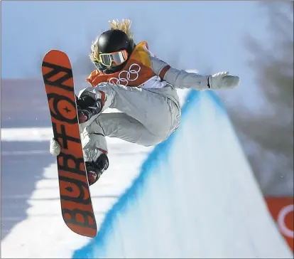  ?? GREGORY BULL — THE ASSOCIATED PRESS ?? American Chloe Kim goes airborne during her gold-medal-winning performanc­e in the women’s halfpipe finals at the Pyeongchan­g Olympics.