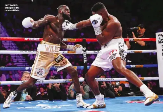  ?? Photo: SEAN MICHAEL HAM/MAYWEATHER PROMOTIONS ?? EASY DOES IT: Ortiz prods the careless Wilder